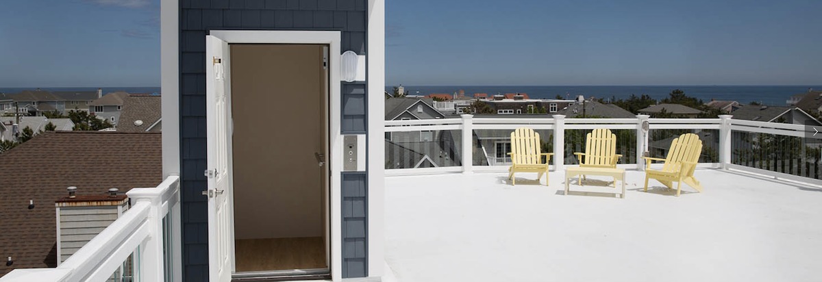 photo of a home elevator leading to a deck overlooking the ocean
