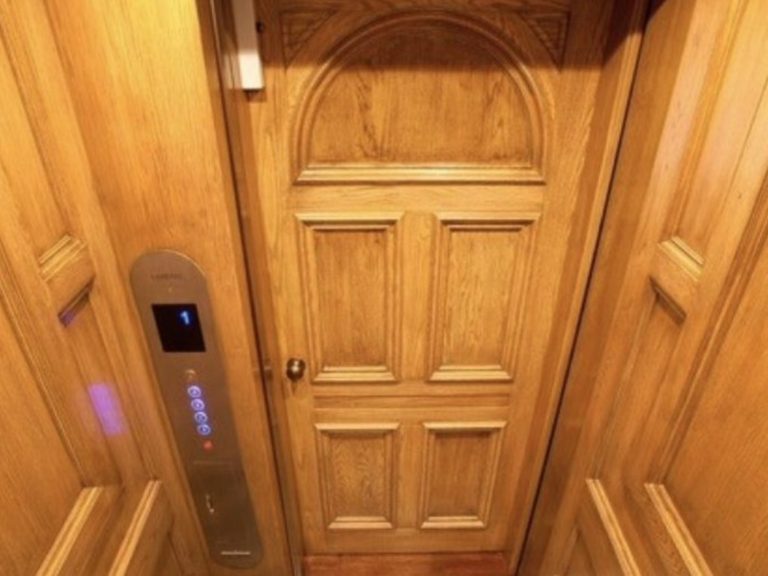 interior home elevator- wood paneling