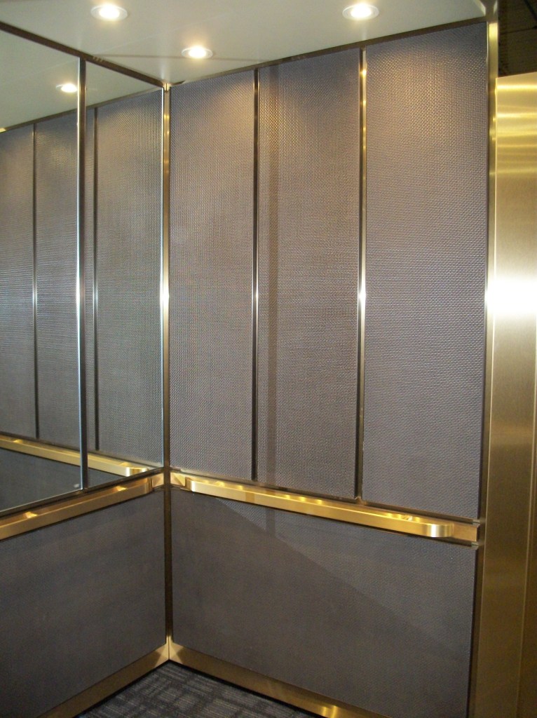 photo of the Canton LU LA Elevator with brass accents