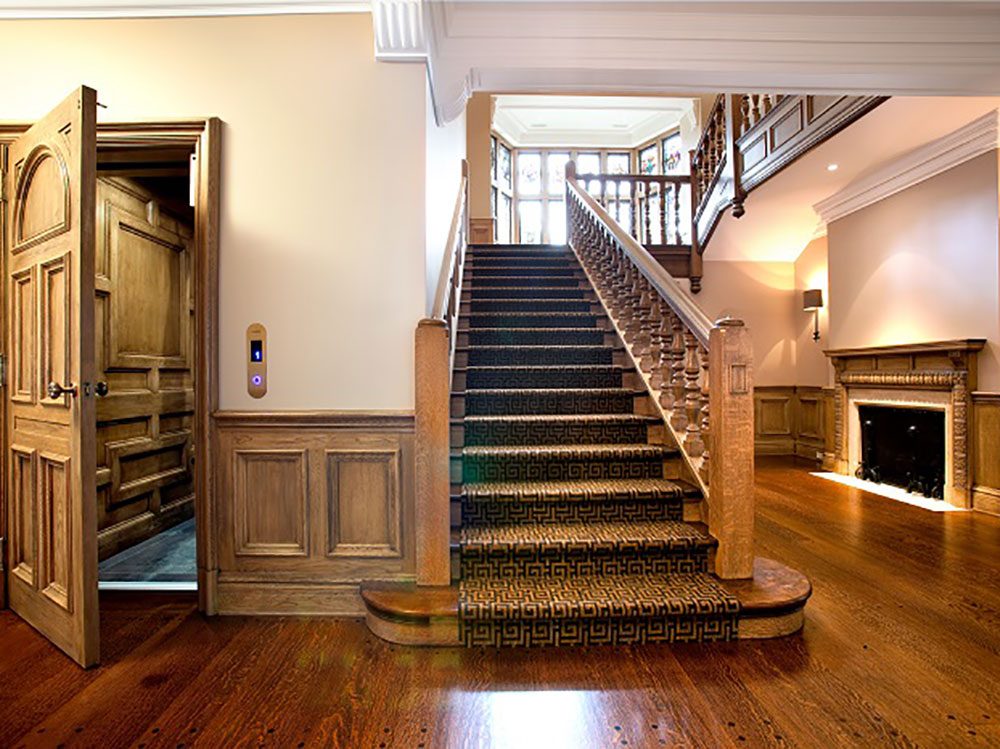 wood paneled elevator installed by RI Elevators