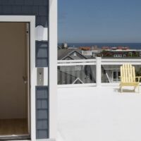 photo of a home elevator leading to a deck overlooking the ocean